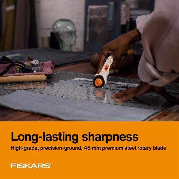Fiskars 45mm Rotary Cutter for Fabric, Premium Steel Stick Fabric Cutter Cuts Through Multiple Layers, Right and Left Handed, Easy and Safe Blade Change, Arts and Crafts, Sewing and Quilting Tools - Image 5